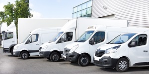 fleet of white commercial vans